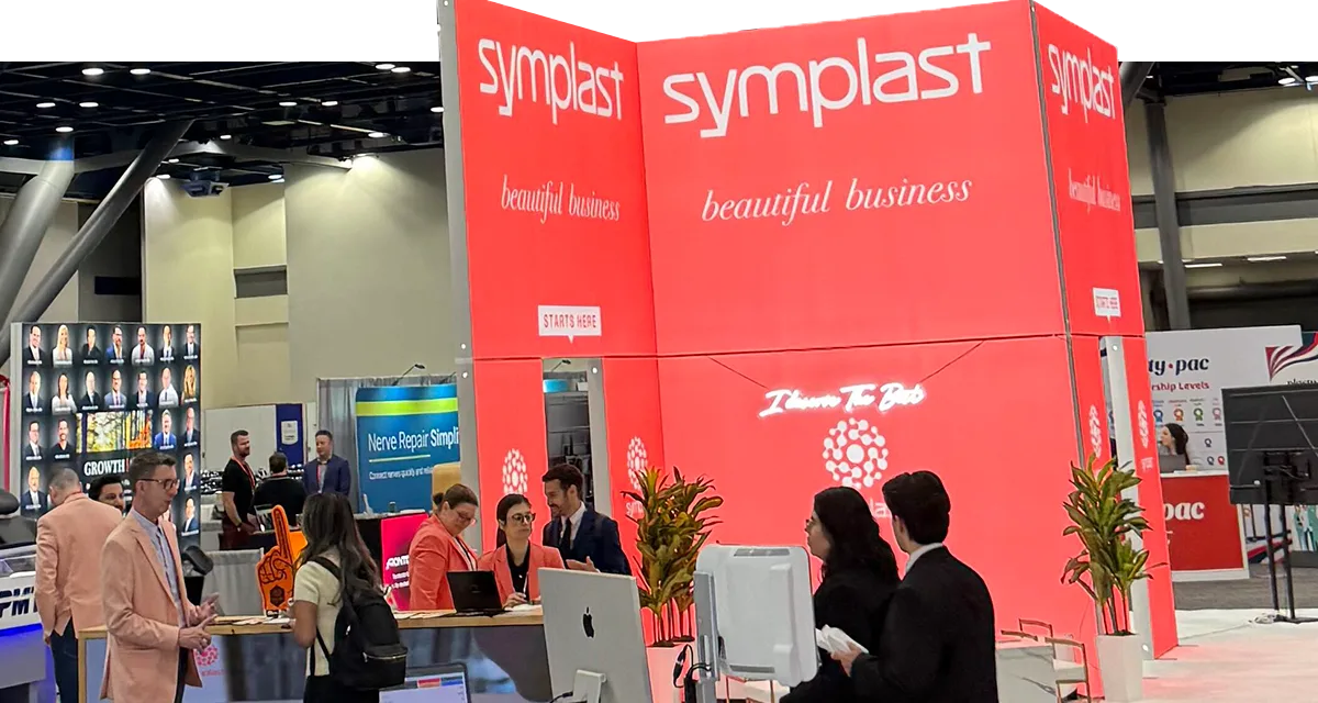 The Symplast booth at PSTM 2026, with its Beautiful Business signage