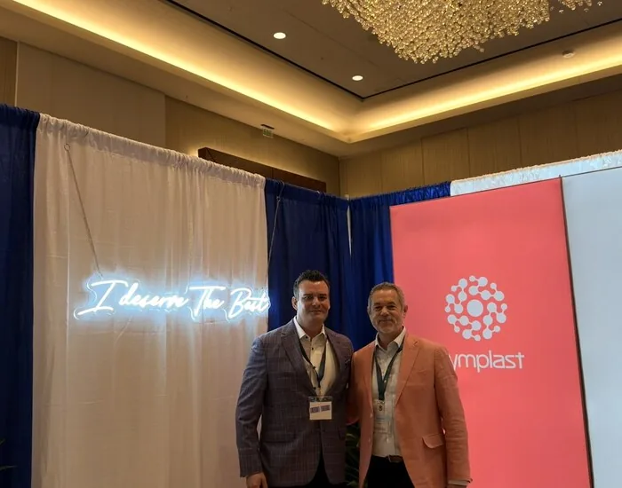 Facundo Formica with Dr. Scott Reis at the Symplast booth during TSPS 2026