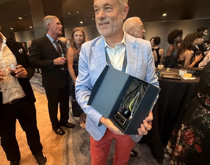 Facundo Formica holding Symplast's TSPS 2026 Select Industry Partner award